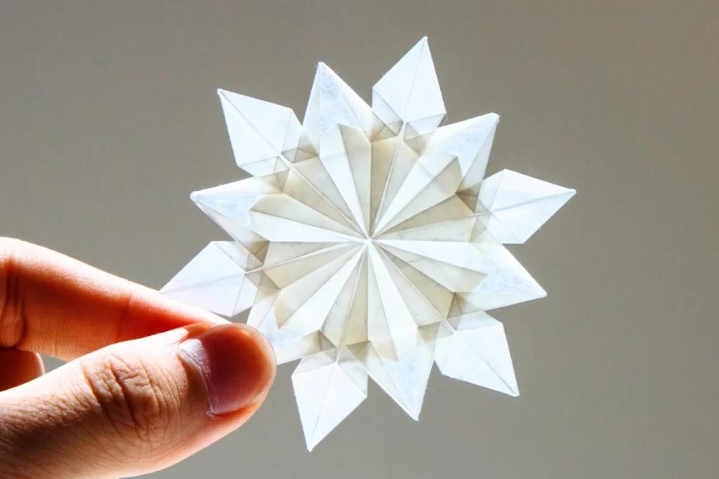 Origami Snowflake: Step-by-Step Instructions - OrigamiOK