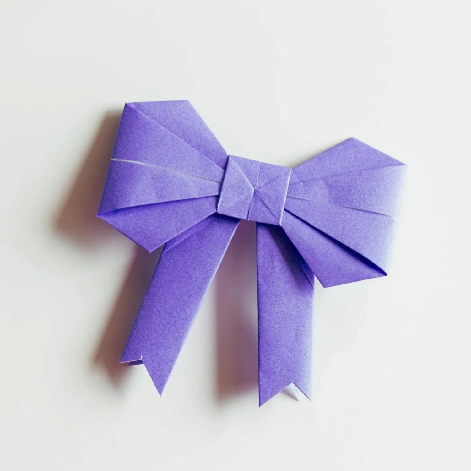 How to Make an Origami Bow - OrigamiOK